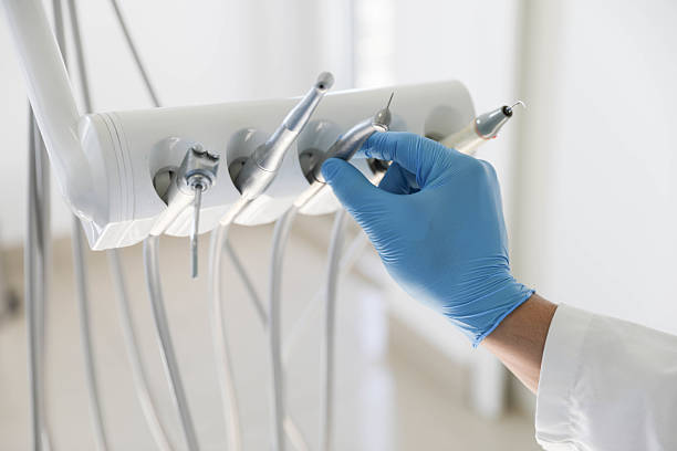Professional Tooth Extraction technician working in McLean, TX